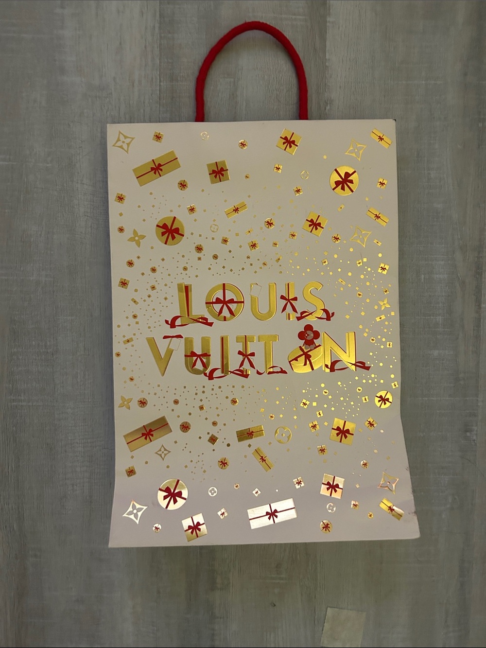 Louis Vuitton White Gift Bag with Gold Foil and Red Accents